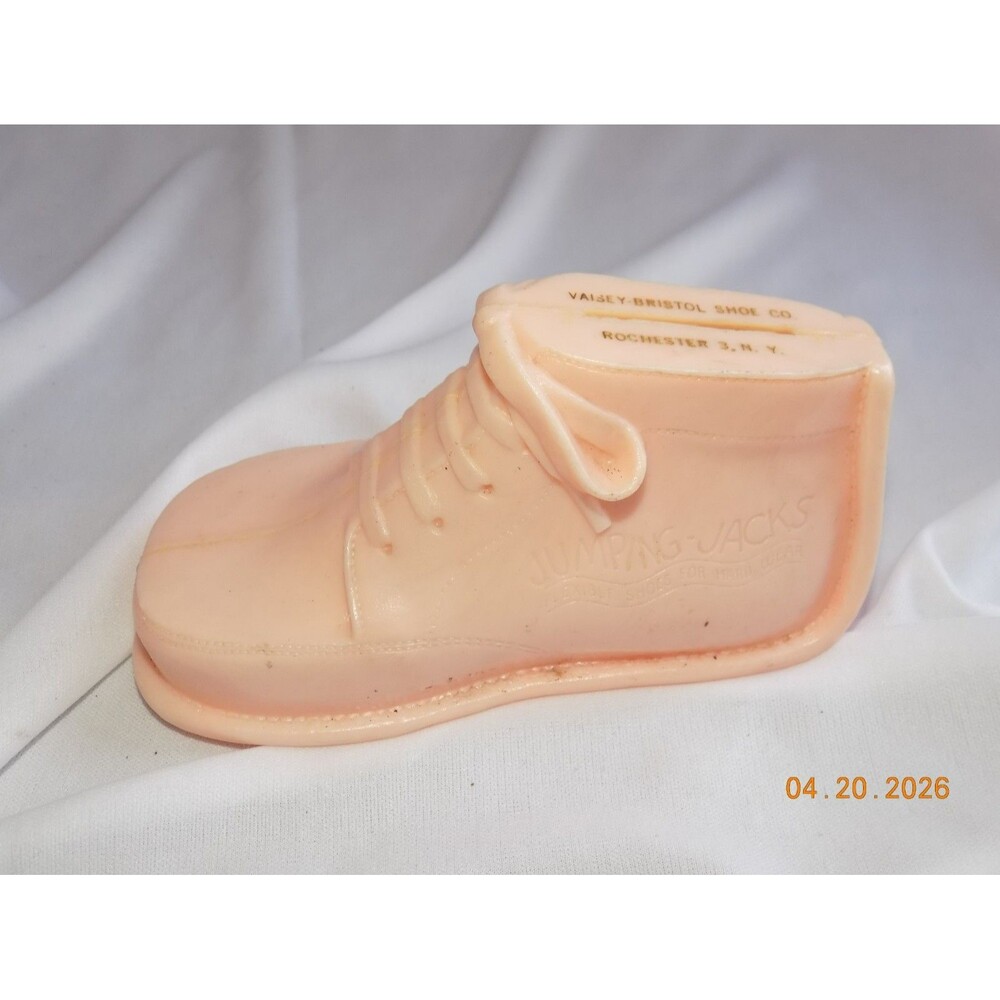Vintage Pink Plastic Jumping Jacks Baby Shoe Bank. VAISEY-BRISTOL SHOE CO INC.